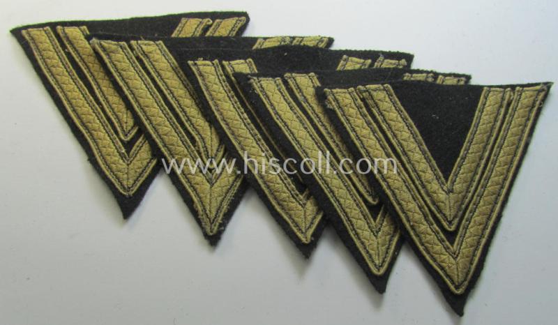 Waffen-SS-type 'Armwinkel' (or: rank-chevron) as executed on black-coloured wool as was specifically intended for usage by an SS-soldier with the rank of: 'SS-Rottenführer'