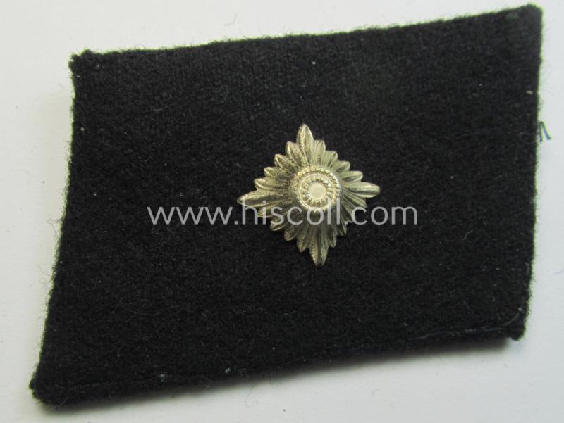 Waffen-SS NCO-pattern rank-collar-rank-tab ('Kragenspiegel') being a 'standard-issue'-pattern example as executed in black-coloured wool as was intended for usage by an: 'SS-Unterscharführer'