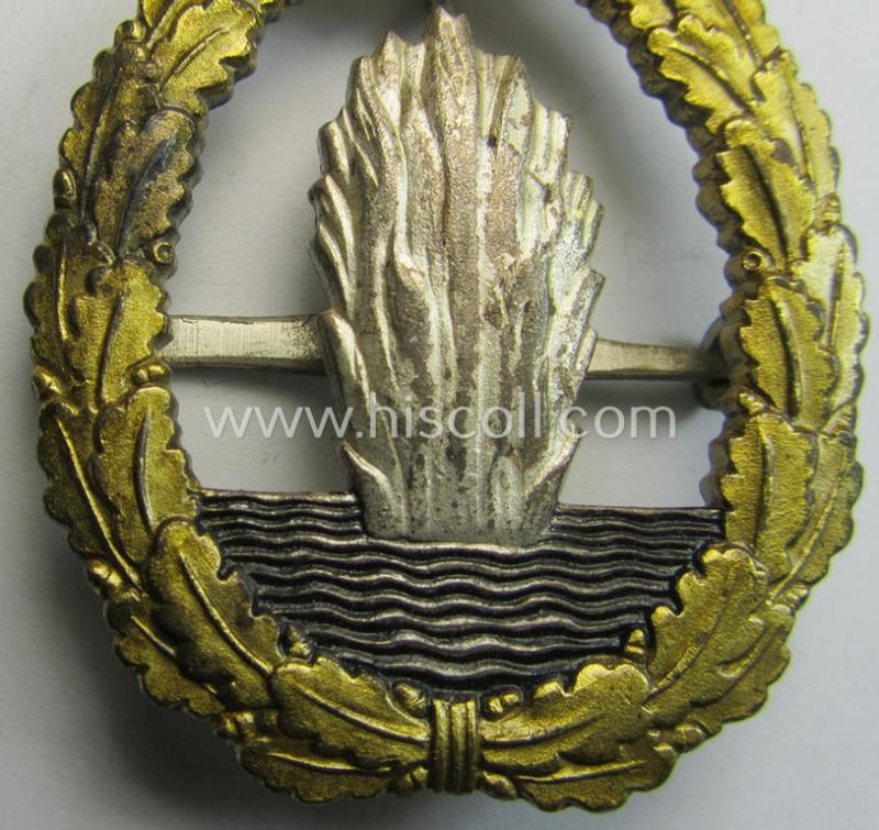 Attractive, WH (Kriegsmarine) 'Kriegsabzeichen für Minensuch-, U-Boot-Jagd und Sicherungs-Verbände' (being a very detailed but non-marked example as produced by the 'Wilh. Deumer'-company) as was executed in multi-coloured 'Buntmetall'