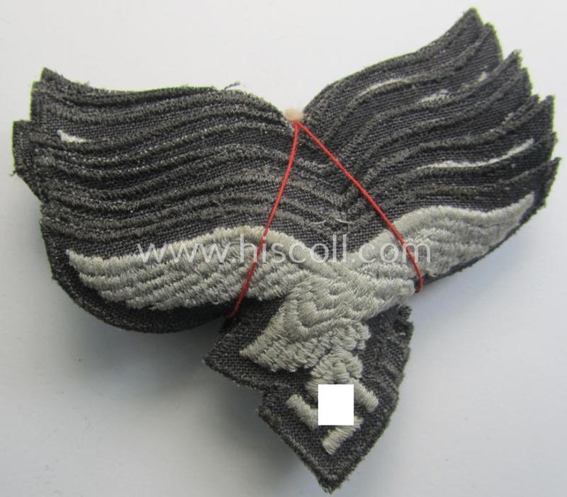 Superb, 'variant'-pattern WH (Luftwaffe) EM- (ie. eventually NCO-) type side-cap eagle (being a 'virtually mint- ie. unissued' example as executed in typical machine-embroidered-pattern onto an unusally seen 'thin-shaped'-background)