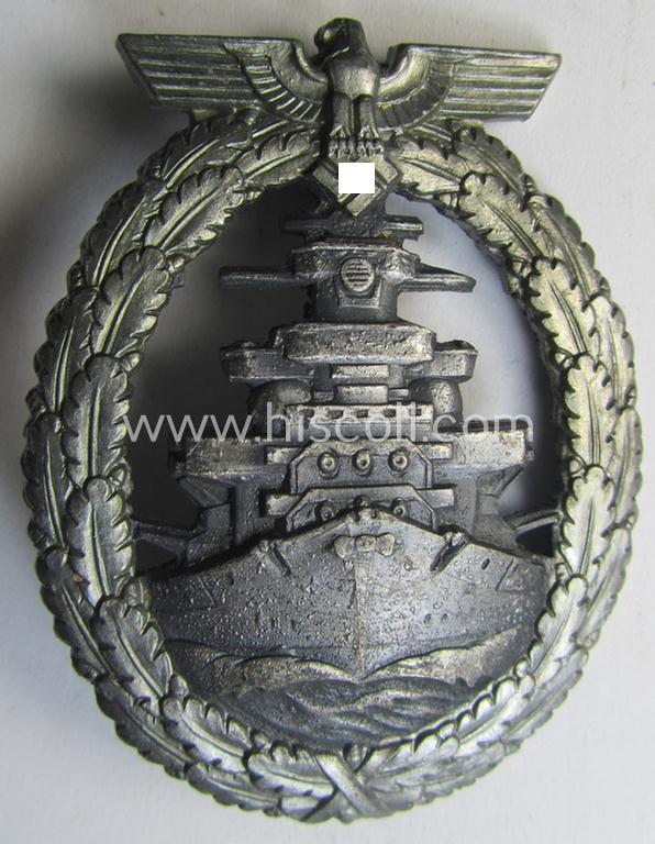 WH (KM) 'Flottenkriegsabzeichen' (or: high-sea fleet badge) being a typical zinc- (ie. 'Feinzink'-) based and/or (I deem) later-war-period version that is neatly maker- (ie. 'Fec. Adolf Bock' ) marked on its back