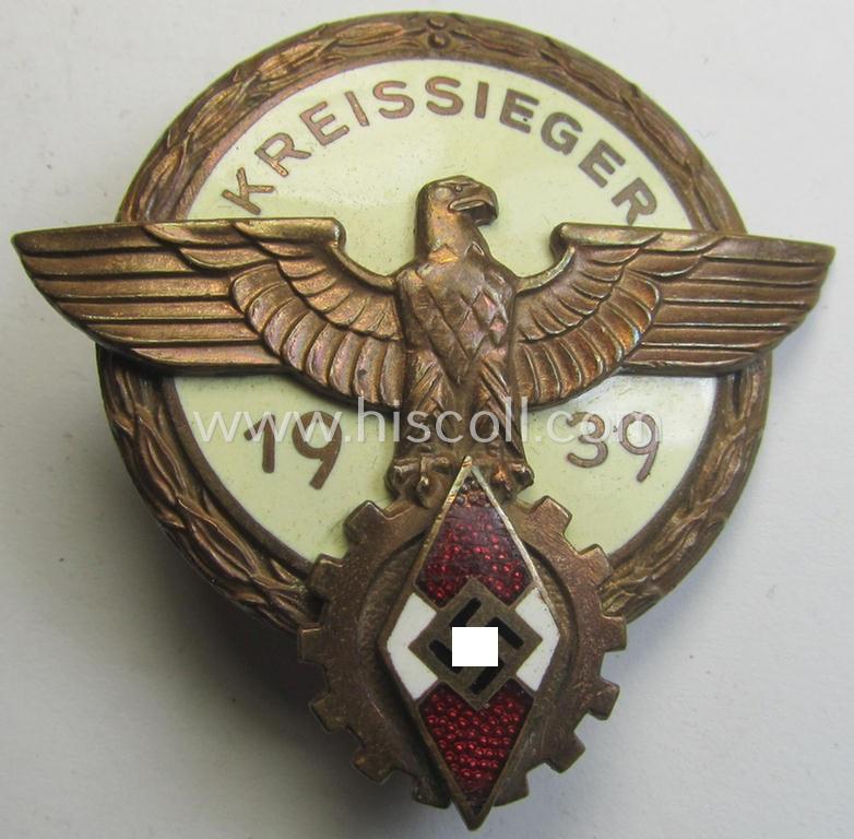 'HJ'- ('Hitlerjugend') ie. 'BDM'- ('Bund Deutscher Mädel') related: 'Reichsberufswettkampf-Siegerabzeichen' (of the 2nd model) entitled: 'Kreissieger 1939' and being a neatly maker- (ie.: 'H. Aurich'-) marked example