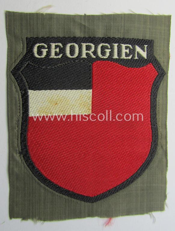 Attractive, 'BeVo'-type armshield entitled: 'Georgien' (being a 'virtually mint- ie. unissued' example as intended for a volunteer who served within the 'Deutsche Wehrmacht' ie. within the 'Georgisches Legion')