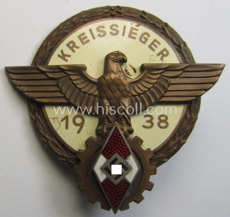 'HJ'- ('Hitlerjugend') ie. 'BDM'- ('Bund Deutscher Mädel') related: 'Reichsberufswettkampf-Siegerabzeichen' (of the 2nd model) entitled: 'Kreissieger 1938' and being a neatly maker- (ie.: 'G. Brehmer'-) marked example
