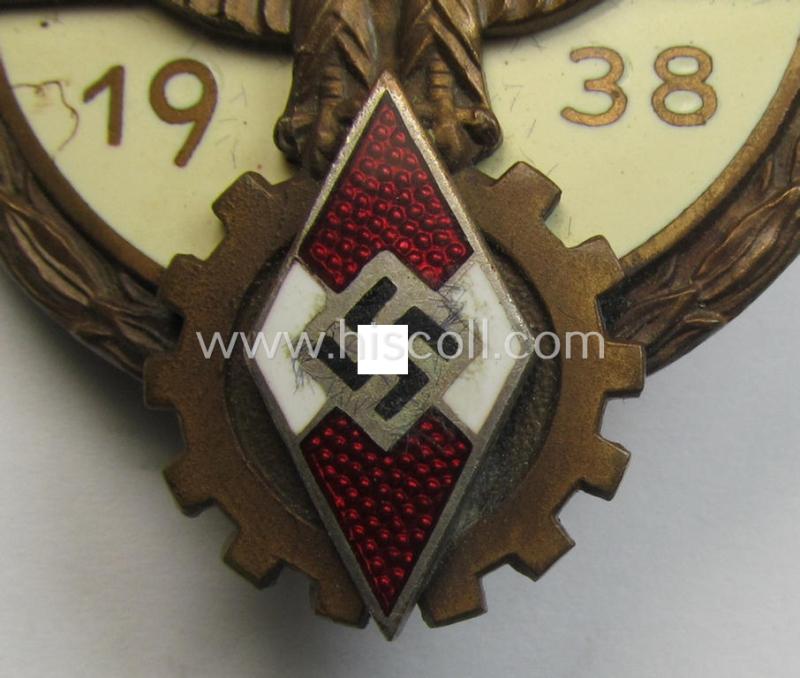 'HJ'- ('Hitlerjugend') ie. 'BDM'- ('Bund Deutscher Mädel') related: 'Reichsberufswettkampf-Siegerabzeichen' (of the 2nd model) entitled: 'Kreissieger 1938' and being a neatly maker- (ie.: 'G. Brehmer'-) marked example