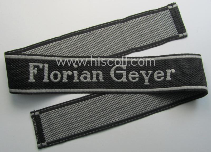Waffen-SS, 1943-pattern cuff-title (ie. 'Ärmelstreifen') depicting the ('BeVo') machine-woven, Latin script text in silverish-grey linnen as was intended for a member of the: '8. SS-Kavallerie-Division “Florian Geyer”