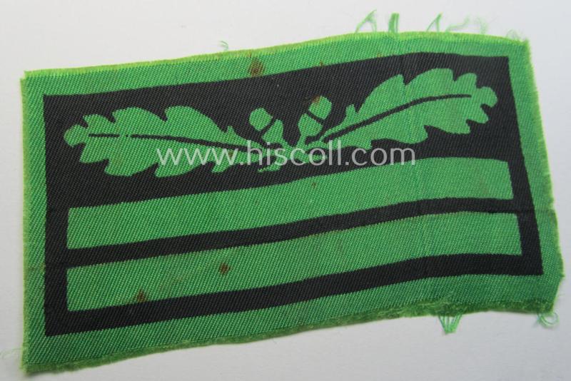 Attractive - clearly used albeit regrettably single! - officers'-pattern, WH (Heeres o. Waffen-SS) rank-insignia-bar (for usage on the camouflaged-uniforms) as used by an officer holding the rank of: 'Oberleutnant' (ie.: 'SS-Obersturmführer')