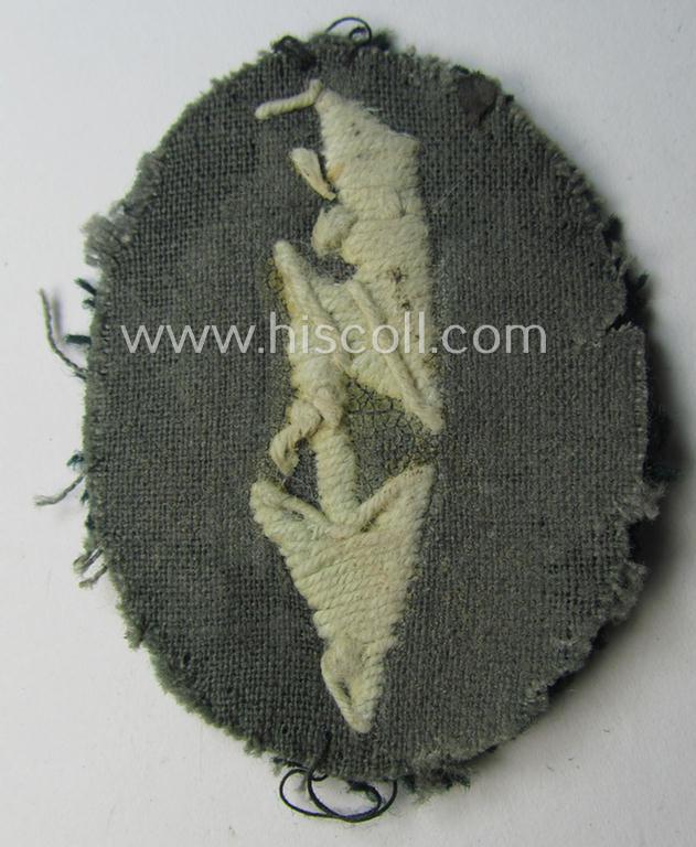 Truly used WH (Heeres) trade- and/or special-career insignia ie. hand-embroidered signal-blitz (being a non-maker-marked example as executed in white) as was intended for a soldier serving within the: 'Infanterie-Truppen'