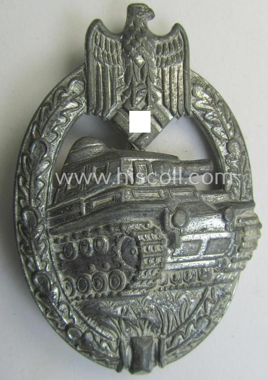'Panzerkampfabzeichen in Silber' (or: silver-class panzer-assault badge or PAB) being a clearly maker- (ie. 'AS' in a triangle-) marked- and/or typical zinc- (ie. 'Feinzink'-) based specimen as was procuced by a to date unknown maker