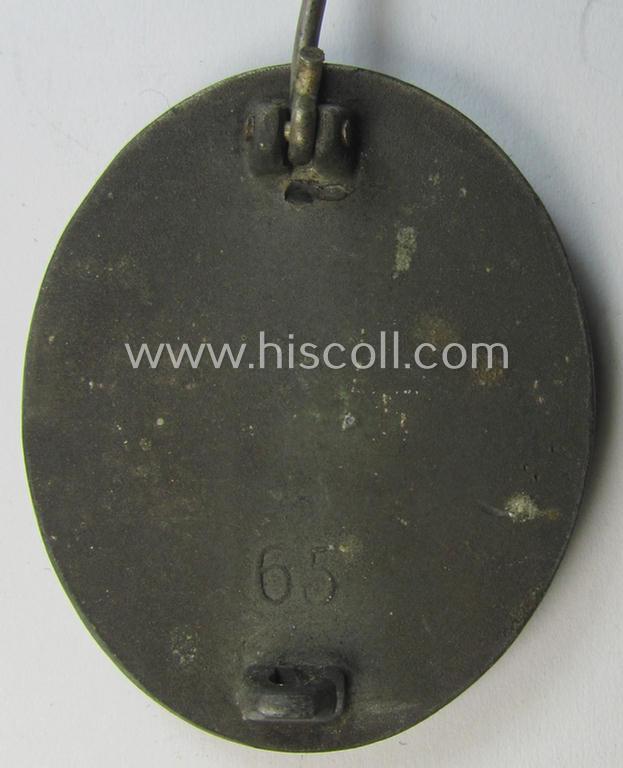 Attractive - and moderately used- and worn! - example of a maker- (ie. '65'-) marked example of a silver-class wound-badge (or: 'Verwundeten-Abzeichen in Silber') as was produced by the 'Hersteller' ie. maker: 'Klein u. Quenzer'