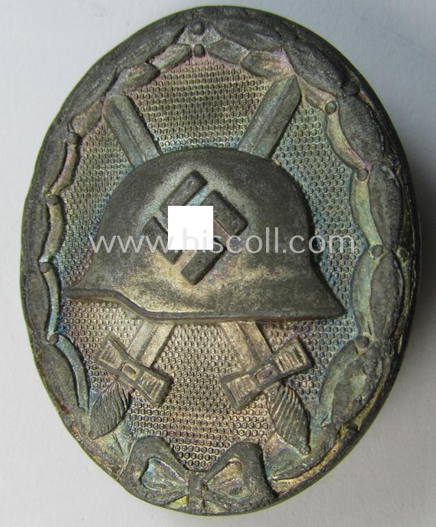 Neat, silver-class woundbadge (or: 'Verwundeten Abzeichen in Silber') being a nicely maker- (ie. '107'-) marked example (as was produced by the desirable 'Hersteller' ie. maker: 'Carl Wild')