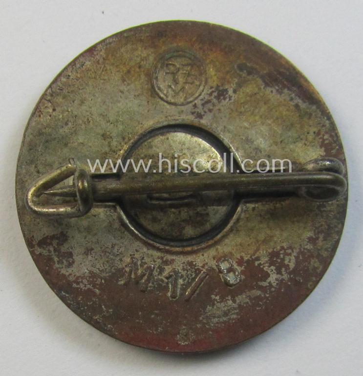 Attractive - bright-red-coloured and nicely preserved! - 'N.S.D.A.P.'-membership-pin- ie. party-badge (or: 'Parteiabzeichen') which is maker-marked on its back with the makers'-designation: 'RzM' and/or: 'M1/8'