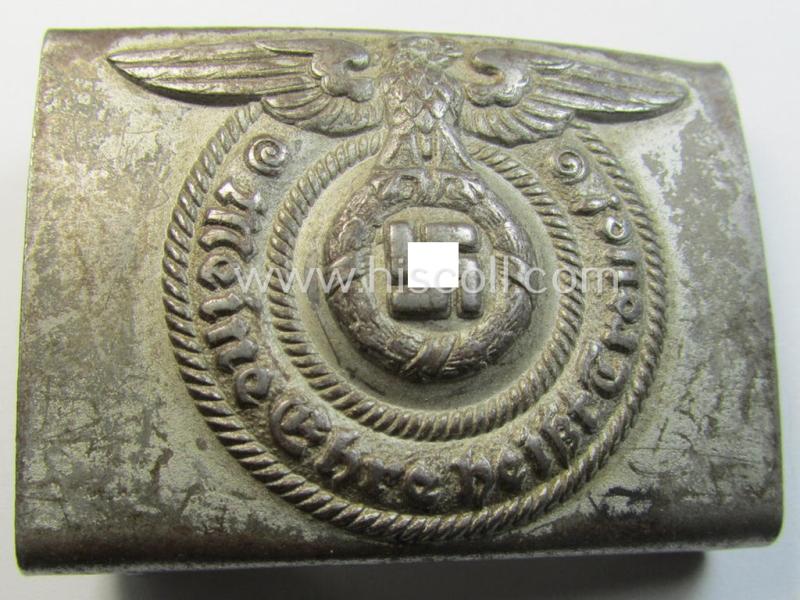 Waffen-SS, EM- (ie. NCO-) type belt-buckle (being a typical, unmarked and typical steel-based: 'Overhoff & Cie'-example) that comes in a surely issued- and/or moderately used- ie. worn, condition