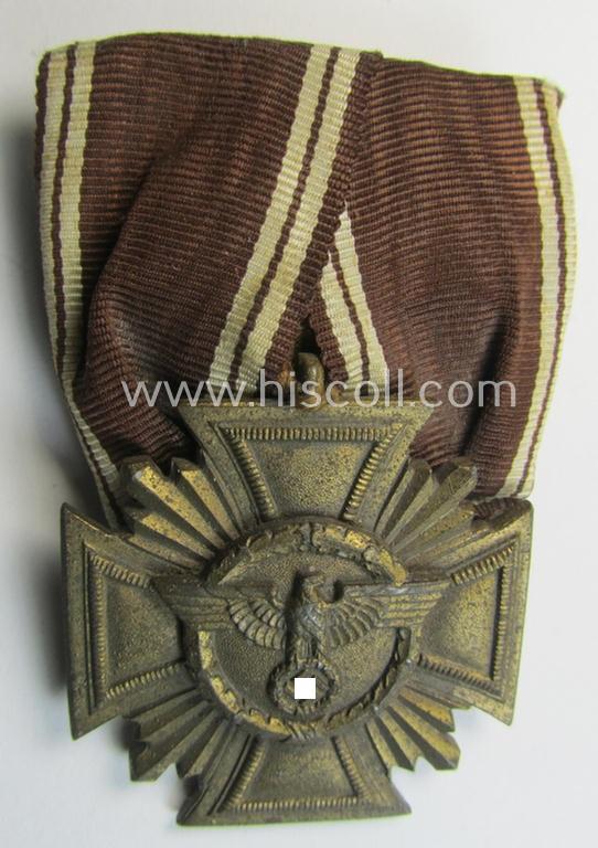 'N.S.D.A.P. DA in Bronze' (ie. '3. Stufe für 10 Jahre t.D.') being a 'regular-weight'-pattern, zinc- (ie. 'Feinzink'-) based example that comes mounted as a so-called: 'Einzelspange'