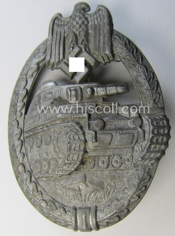 'Panzerkampfabzeichen in Silber' (or: silver-class panzer-assault badge or PAB) being a non-maker-marked- and/or hollow zinc- (ie. 'Feinzink'-) based example as was produced by the: 'Paul Meybauer'-company
