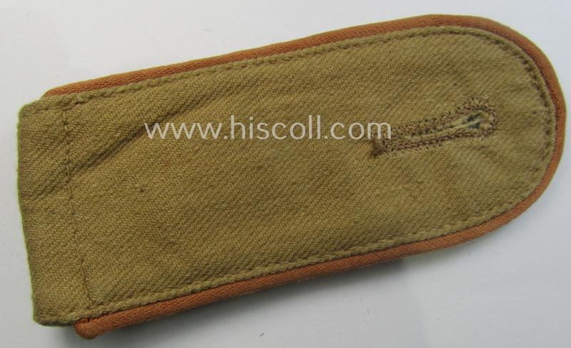 Single, WH (Luftwaffe) tropical-issued, EM-type-shoulderstrap as executed in beige-coloured linnen (as was specifically intended for usage on the tropical-shirts ie. tunics) as was intended for a: 'Soldat der Nachrichten-Truppen'
