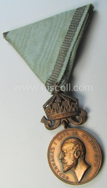 Attractive, reddish-bronze-toned Bulgarian 'Royal Medal of Merit with Crown' (or: in Bulgarian- ie. Cyrilic language: 'Ordena Za Zasluga') being a neat and/or detailed example of (I deem) the 3rd Class
