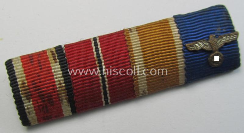 4-pieced, WH ie. WWII-period ribbon-bar (ie. 'Feld- o. Bandspange') showing the ribbons for an: 'EK II.Kl.', an: 'Ost'-medal, a: 'Westwall'-medal and a: WH 'Dienstauszeichnung der 4. Stufe'