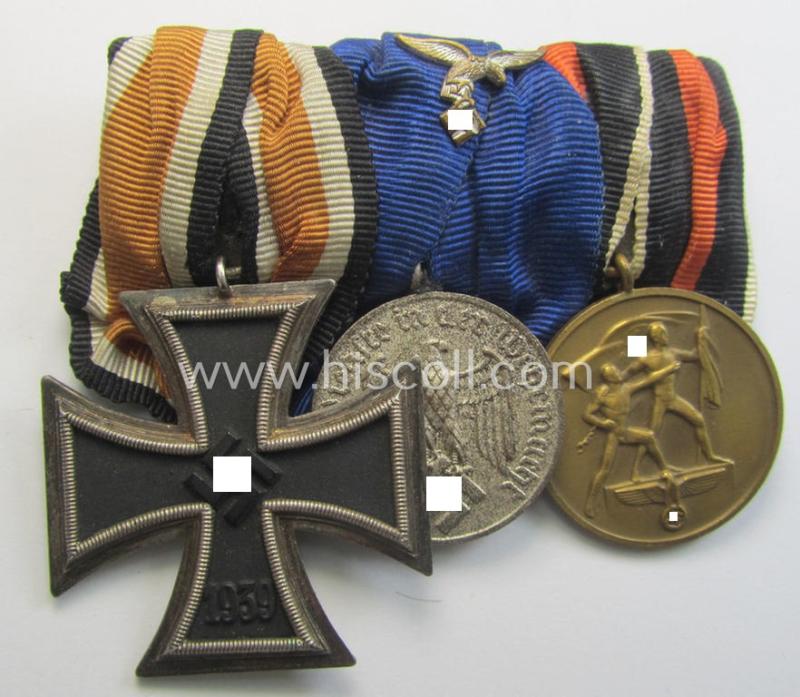 Three-pieced WH (Luftwaffe) medal-bar (ie.: 'Ordenspange') resp. showing an: 'EKII. Kl.', a: 'WH-DA der 4. Stufe' (with down-tailed eagle-device) and a: Czech 'Anschluss'-medal