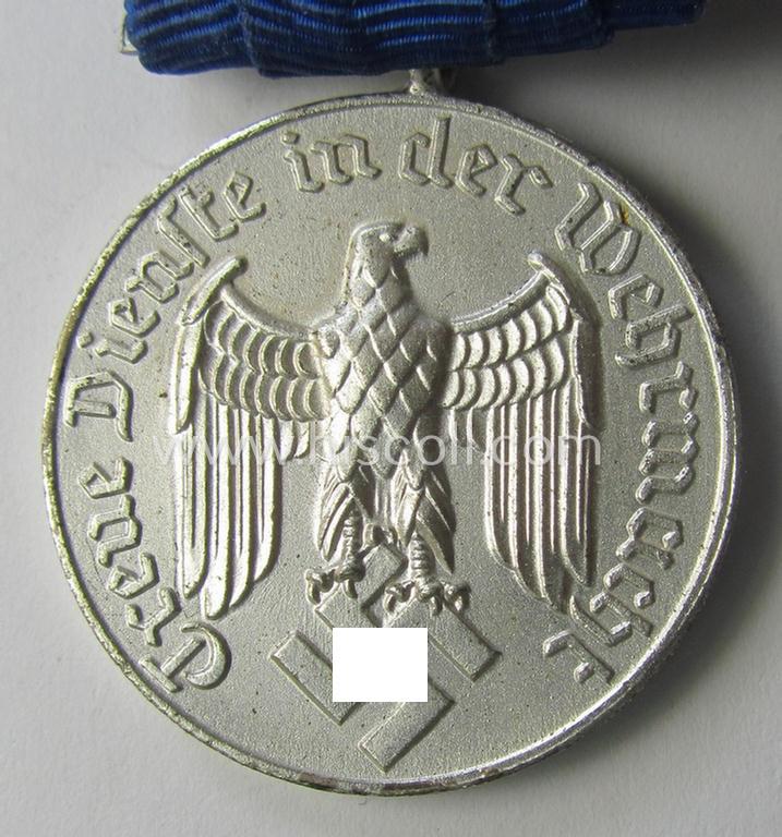 Attractive, silver-toned & detachable WH (Heeres o. KM) so-called: 'Einzelspange' showing a: 'WH-Dienstauszeichnung 4. Stufe' (as was intended for 4 years of loyal-service) and that shows a detailed, Heeres o. KM-type-eagle-device, period-attached