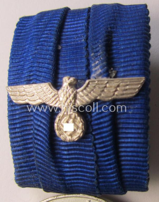 Attractive, silver-toned & detachable WH (Heeres o. KM) so-called: 'Einzelspange' showing a: 'WH-Dienstauszeichnung 4. Stufe' (as was intended for 4 years of loyal-service) and that shows a detailed, Heeres o. KM-type-eagle-device, period-attached