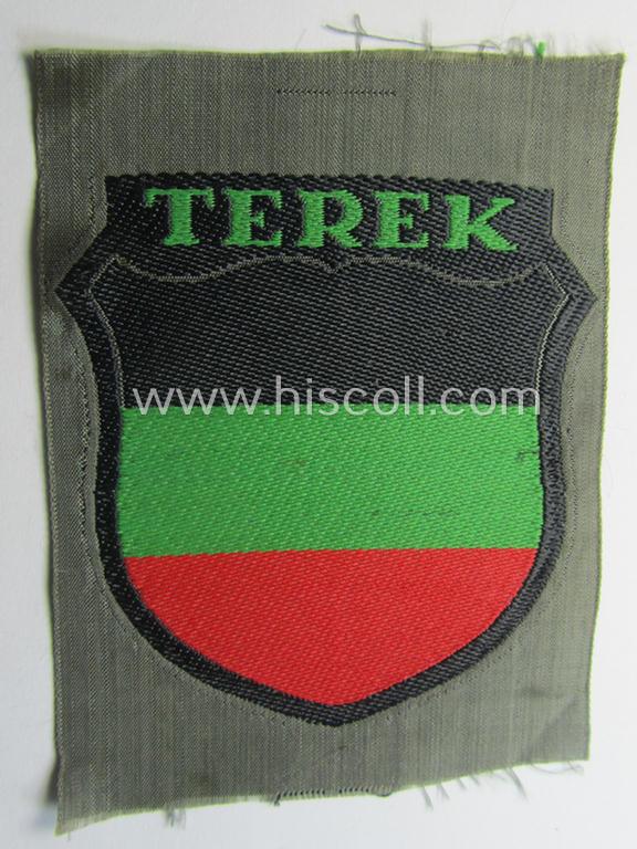 'BeVo'-type armshield (of the second pattern) entitled: 'Terek' being a piece as was intended for a volunteer who served within the 'Deutsche Wehrmacht' ie. within the 'Terek-Kosakken'