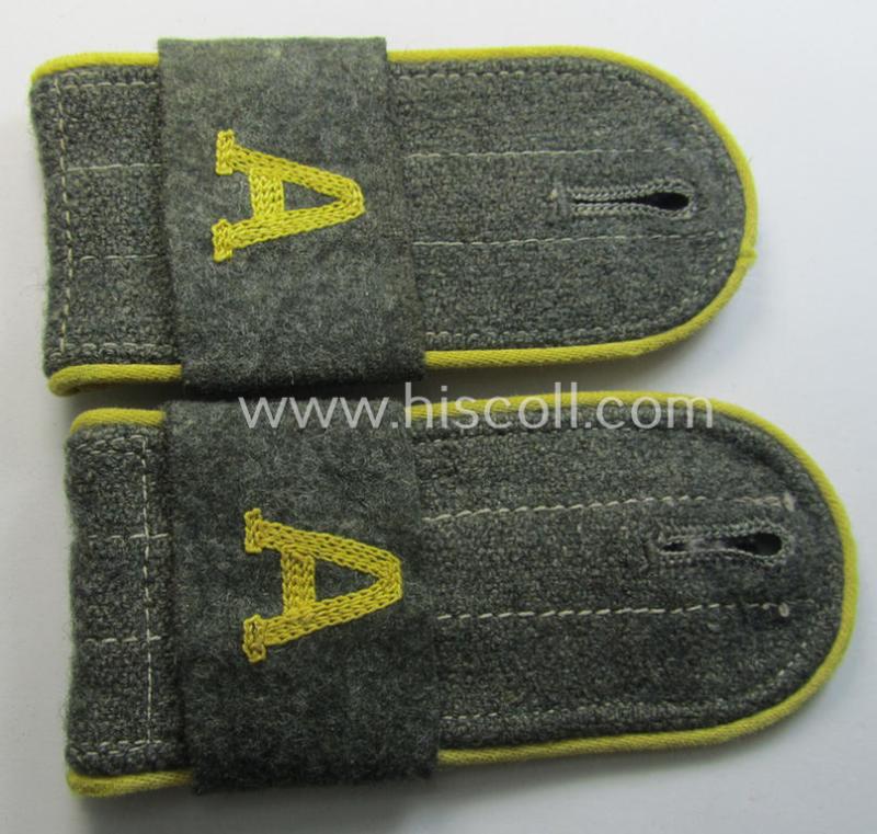 Pair of later-war-period, WH (Heeres) so-called: 'M44'-styled ie. 'simplified', EM-type shoulderstraps having a pair of 'A'-'Überschuben' attached as intended for a: 'Soldat eines Nachr.-Rgts. o. Abts.'