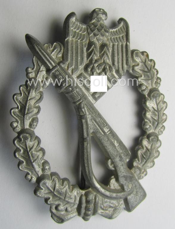 Attractive, 'Infanterie Sturmabzeichen in Silber', being an unmarked (and/or converse- ie. vaulted-) 'hollow-back' example by the maker: 'Friedrich Linden' (ie. 'F.L.L.') as executed in greyish-silver-coloured, zinc-based metal (ie. 'Feinzink')