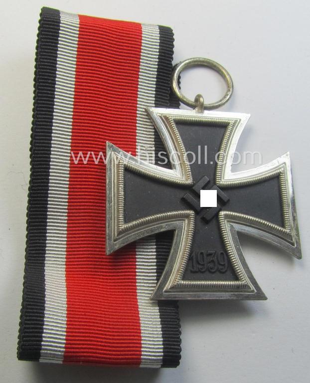 'Eisernes Kreuz II. Klasse' being a (typical) non-maker-marked example that comes together with its original- and never-mounted ribbon (ie. 'Bandabschnitt') as was produced by a (by me) unidentified maker (ie. 'Hersteller')