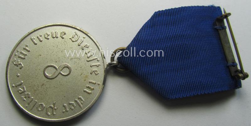 Superb, bright-silver-toned so-called: 'Polizei-Dienstauszeichnung 3. Stufe' (or: police loyal-service medal 3rd class) that comes mounted onto its period ribbon (ie. 'Bandabschnitt') and that comes stored in its scarcely seen, green-coloured etui