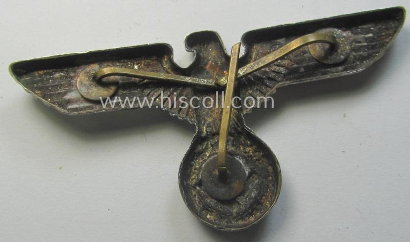 Attractive, just moderately used- and silverish-coloured- (and/or: 'Buntmetall'-based) (political-style) visor- (ie. 'Schirmmützen'-) cap-eagle being a detailed example that is neatly: 'RzM' and/or 'M1/24' marked on its back