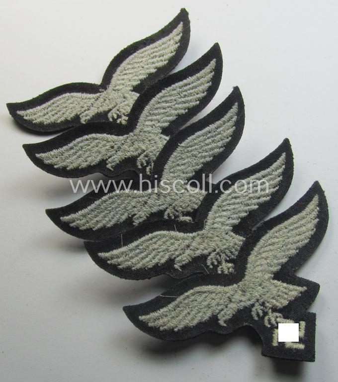 Attractive, WH (Luftwaffe) cap-eagle (being a 'standard-issue'-pattern example as executed onto a black-coloured and woolen-based background and as such intended for usage on the black-coloured work- ie. 'HG'-related side-caps ie. 'Schiffchen')