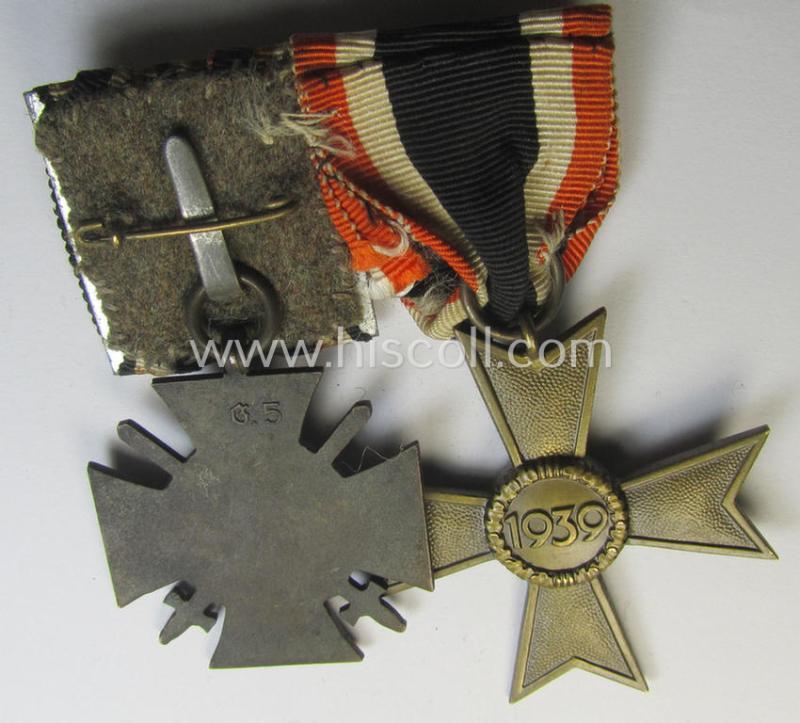 Attractive, WWI- (ie. Third Reich-) period so-called: 'Doppelspange' (being of the partly non-'detachable-pattern') showing resp. a: 'KvK II. Klasse ohne Schwertern' and a: 'FKK 1914-18 mit Schw.' and that comes as recently found