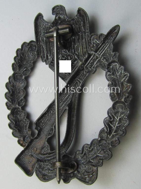 Superb, 'Infanterie Sturmabzeichen in Bronze' being a maker-marked (and/or very converse- ie. vaulted-) 'hollow-back' example by the maker: 'Friedrich Linden' (ie. 'F.L.L.') as was executed in bronze-coloured, zinc-based metal (ie. 'Feinzink')