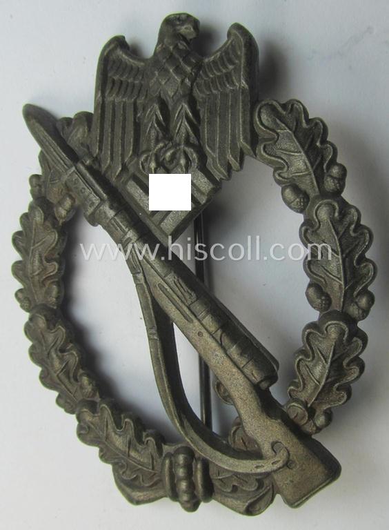 Superb, 'Infanterie Sturmabzeichen in Bronze' being a maker-marked (and/or very converse- ie. vaulted-) 'hollow-back' example by the maker: 'Friedrich Linden' (ie. 'F.L.L.') as was executed in bronze-coloured, zinc-based metal (ie. 'Feinzink')