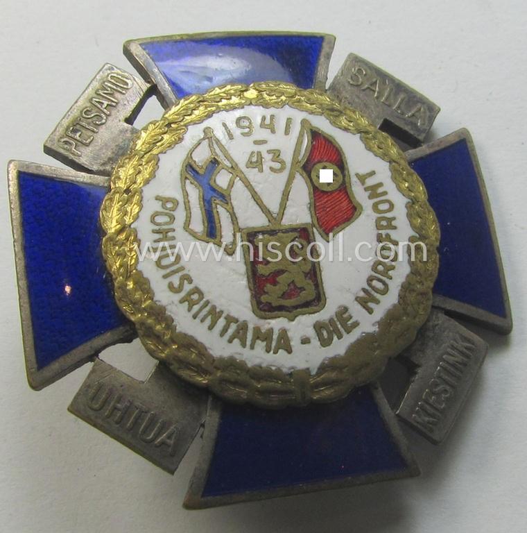 Attractive - and scarcely encountered! - so-called: Finnish-/German: 'Nordfrontkreuz', being a white-/blue-coloured and maker- (ie. 'Hopeatakomo o.y.'-) marked 'variant' that shows the text: 'Pohjoisrintama - Die Nordfront - 1941/43'
