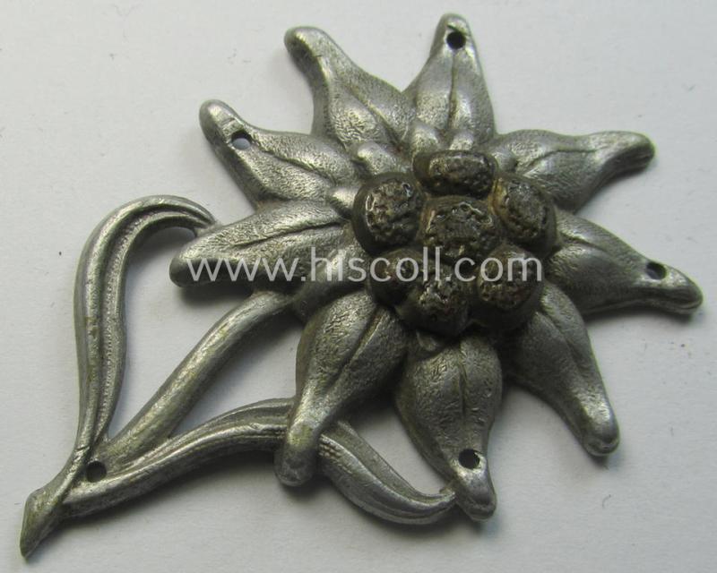 WH (Heeres) silverish-coloured and aluminium-based (albeit non-maker-marked) so-called: M43-cap-badge (ie. 'Mützenabzeichen') depicting an: 'Edelweiss'-flower as was used by the various 'Gebirgsjäger'- (ie. mountain-troops-) related divisional-staff