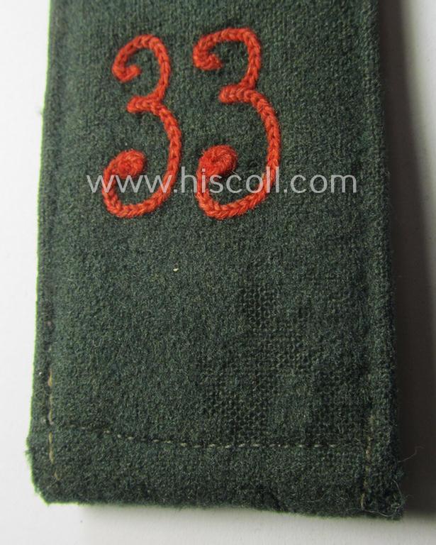 Single, WH (Heeres) EM-type 'cyphered' shoulderstrap: 'Soldat des Artillerie-Regiments 33'