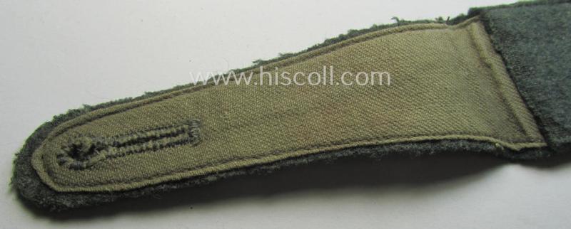 Single, WH (Heeres) EM-type 'cyphered' shoulderstrap: 'Soldat des Artillerie-Regiments 33'