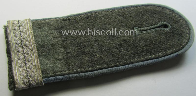 Single, mid-war period- (ie.: 'M43'-pattern) WH (Heeres) EM-type shoulderstrap: 'Soldat u. Offz.-Anw. einer Nachschub-Abtlgs.'