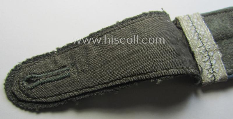 Single, mid-war period- (ie.: 'M43'-pattern) WH (Heeres) EM-type shoulderstrap: 'Soldat u. Offz.-Anw. einer Nachschub-Abtlgs.'