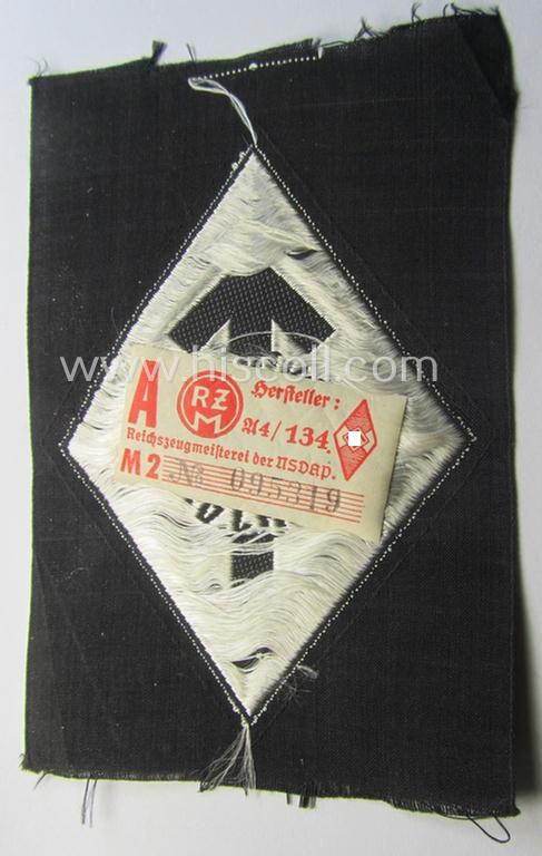 HJ- (ie. 'Hitlerjugend') 'Leistungsabzeichen in Silber in Stoff' that retains its 'RzM'-etiket