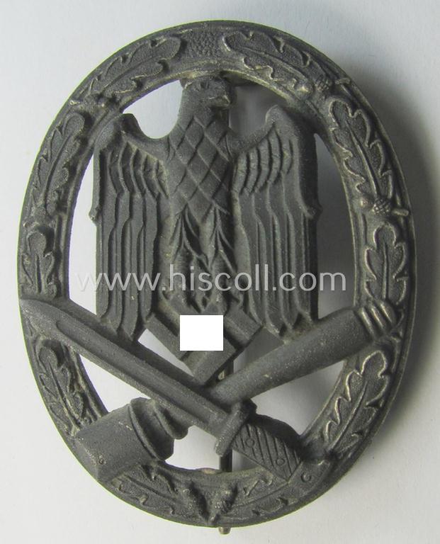 'Allgemeines Sturmabzeichen' being a non-maker-marked, zinc- (ie. 'Feinzink'-) based example by: 'C.E. Juncker'