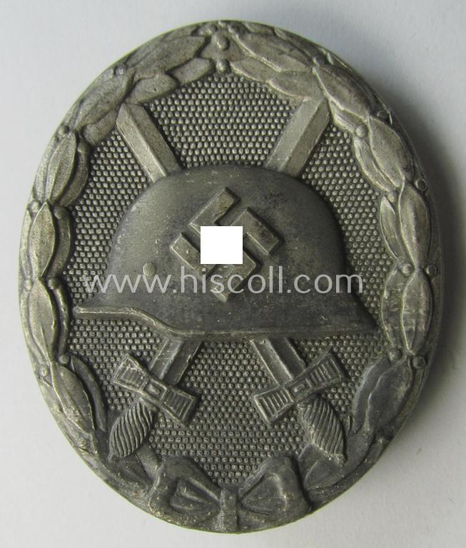 'Verwundeten-Abzeichen in Silber' being a maker- (ie. 'L/18'-) marked example by the: 'B.H. Mayer's Kunstprägeanstalt' (as executed in the rare 'pillow-crimped'-pattern!)