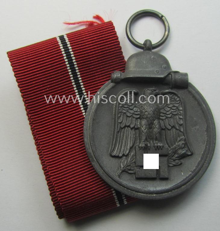 Medal-set: 'Winterschlacht im Osten 1941-42' being a maker- (ie. '3'-) marked specimen by the maker: 'Wilhelm Deumer'