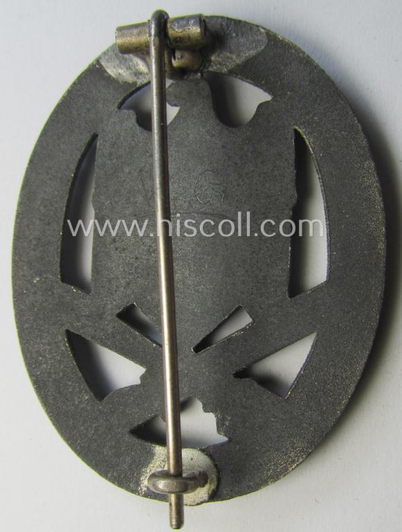 'Allgemeines Sturmabzeichen' being a non-maker-marked, zinc- (ie. 'Feinzink'-) based example by: 'C.E. Juncker'