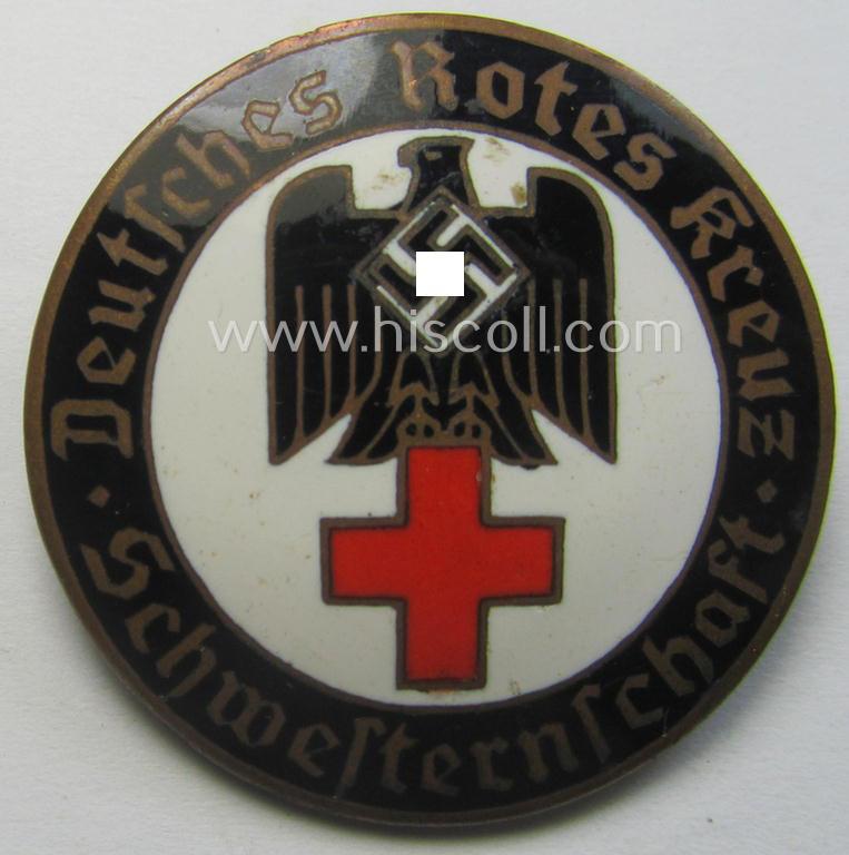 DRK nurses'-badge entitled: 'Schwesternschaft' being a medium-sized version showing a bearers'-number: ('668'), towns-name: ('Karlsruhe') and/or makers'-mark ('A. Stübbe - Berlin')