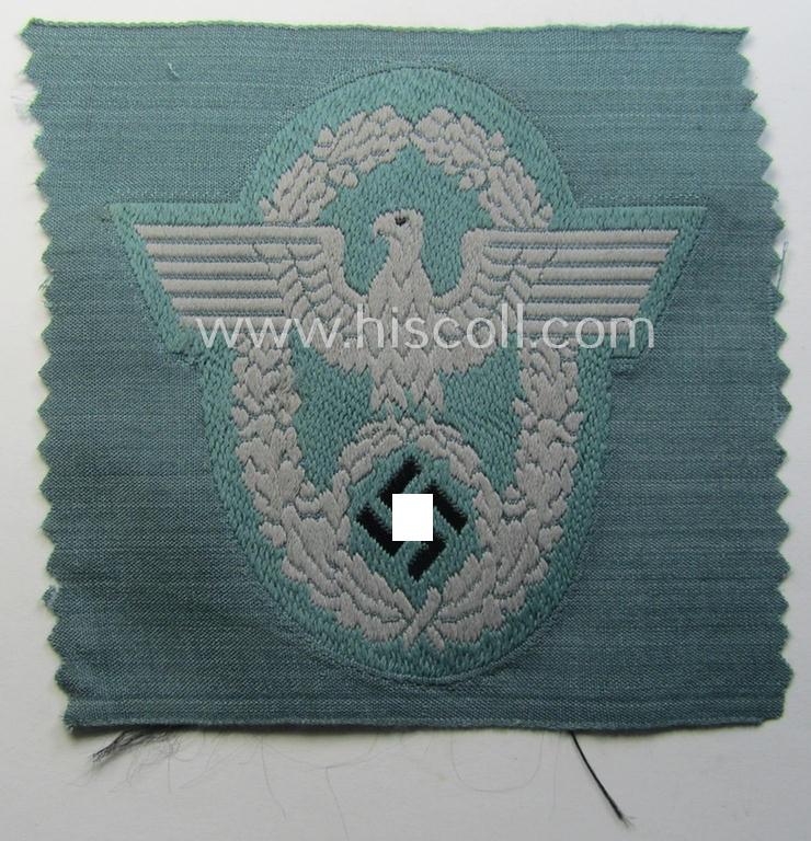 Police- (ie. 'Polizei'-) related armbadge (ie. arm-eagle) being a typical 'BeVo'-woven example