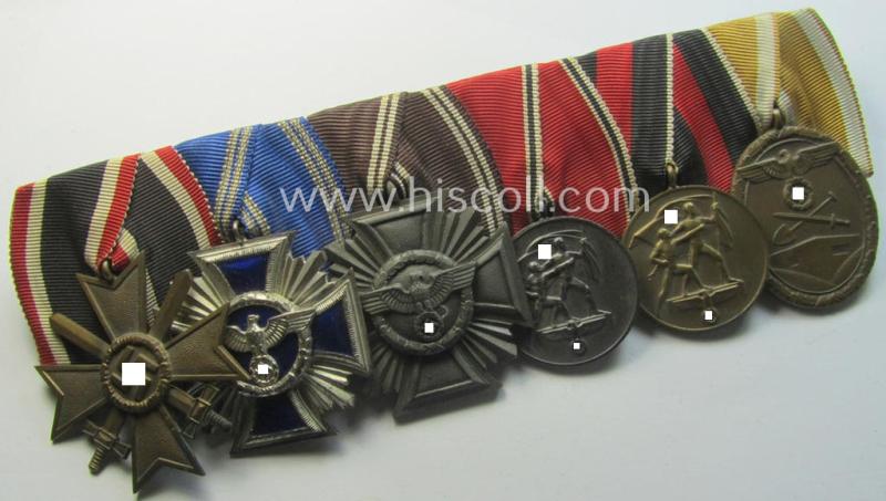 6-pieced N.S.D.A.P.-related 'Ordenspange' showing a: 'KvK II.Kl. m. S.', a: D.A. in Silber' (ie. '2. Stf. für 15 Jahre t.D.'), a: 'D.A. in Bronze' (ie. '3. Stf. für 10 Jahre t.D.') two 'Anschluss'-medals and a: 'Westwall'-medal