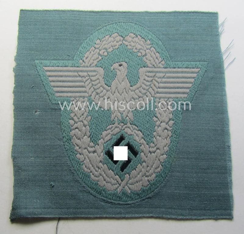 Police- (ie. 'Polizei'-) related armbadge (ie. arm-eagle) being a typical 'BeVo'-woven example